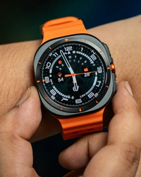 Samsung-watch-on-a-wrist-with-orange-strap